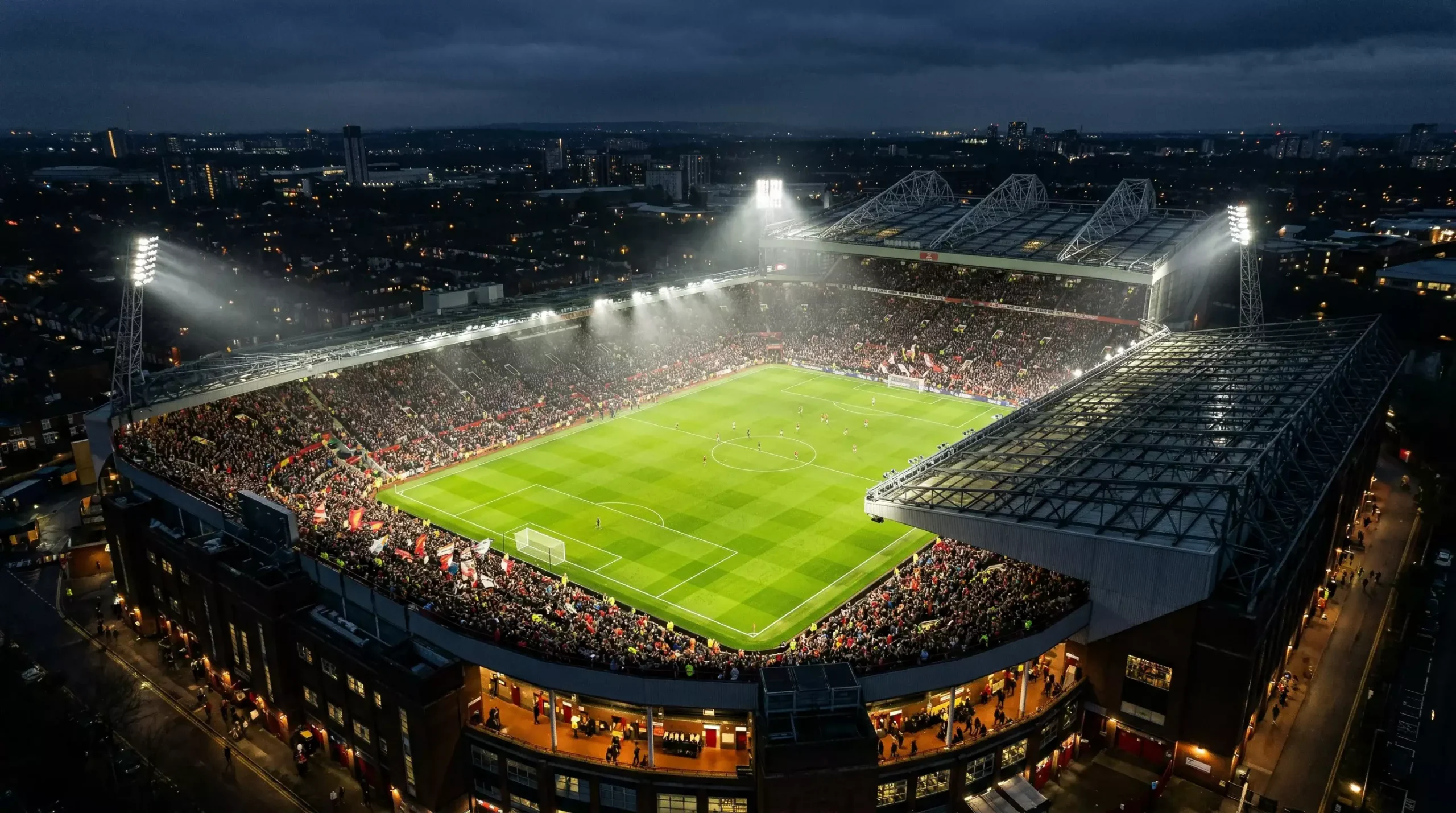 Estadio de la Premier League iluminado para apuestas de fútbol inglés